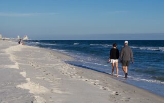 Couple on the beach in Orange Beach, Alabama